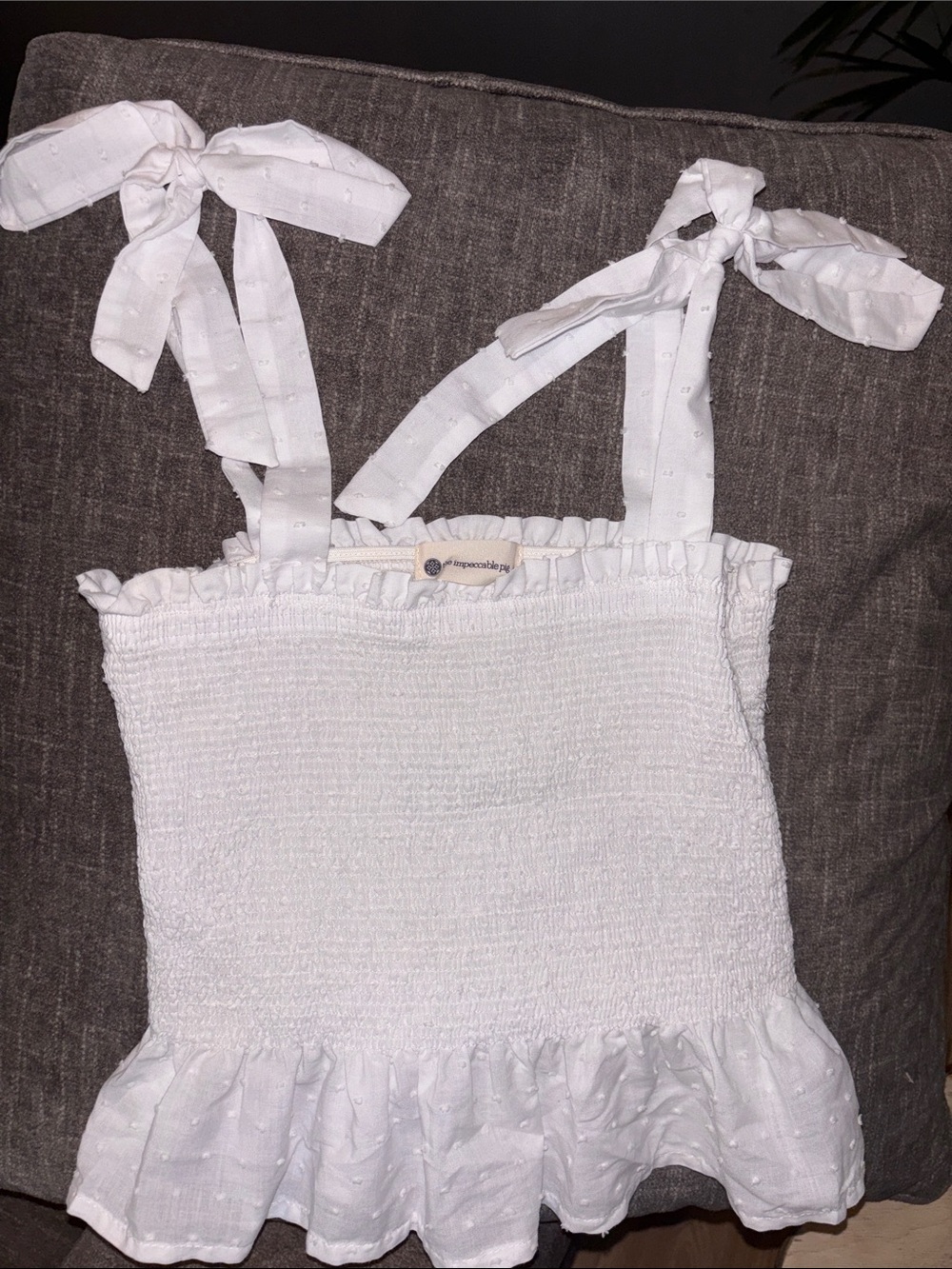 The Impeccable Pig White Smocked Ruffle Top